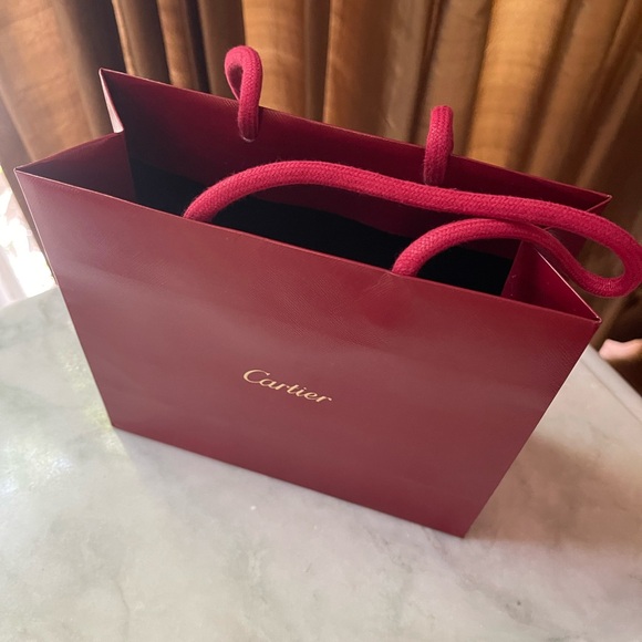 Four brand new Cartier perfume samples plus a Cartier shopping bag. - Picture 4 of 6